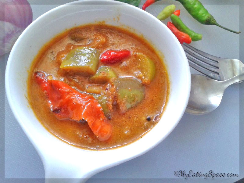 Burnt eggplant curry, theeyal, Kerala side dish with rice