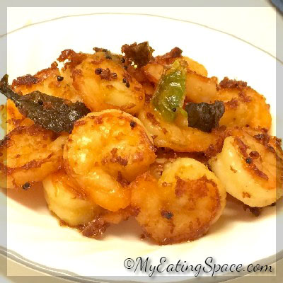 Make a healthy and spicy Ginger- Chilli Prawn /shrimp fry with a few ingredients.