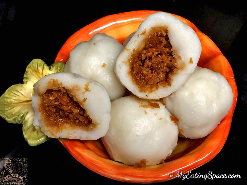 Delicious oil-free, gluten-free Coconut stuffed dumplings made with rice flour and sweetened coconut makes a great sweet snacks or breakfast. In Kerala this sweet is known as kozhukatta.