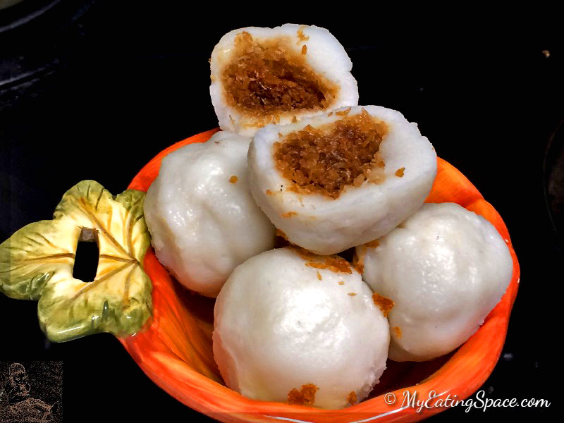 Delicious oil-free, gluten-free Coconut stuffed dumplings made with rice flour and sweetened coconut makes a great sweet snacks or breakfast. In Kerala this sweet is known as kozhukatta.