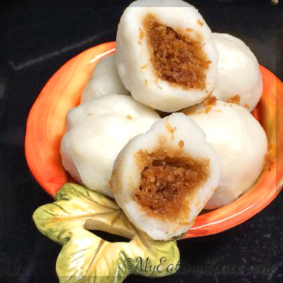 Delicious oil-free, gluten-free Coconut stuffed dumplings made with rice flour and sweetened coconut makes a great sweet snacks or breakfast. In Kerala this sweet is known as kozhukatta.