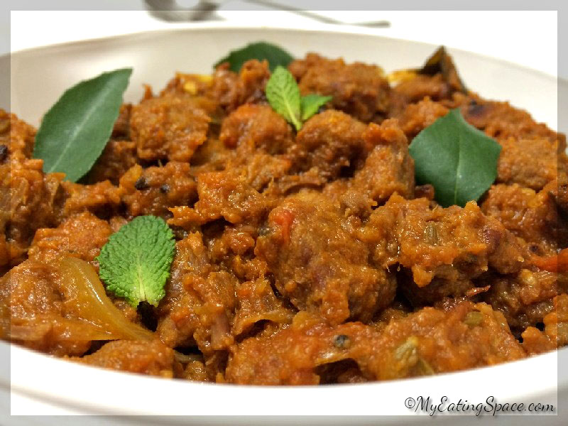 Beef curry- Kerala style and spicy. The tempting aroma of this dish will make you crave more of this spicy beef curry.