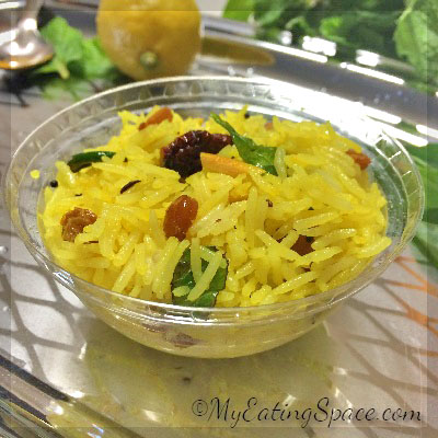 Lemon rice with chickpeas to add the nutty, crunchy flavor. This is the best travel food that is easy to prepare and goes with any side dish, even with pickles or raita.