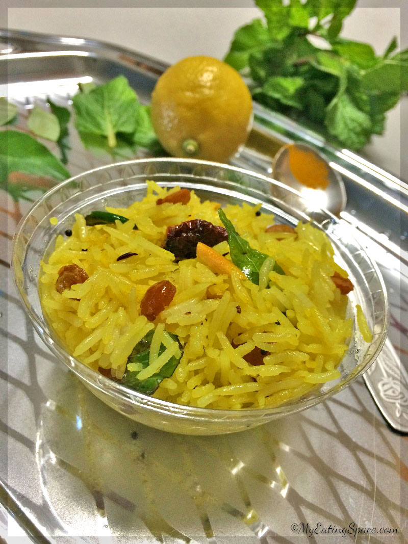 Lemon rice with chickpeas to add the nutty, crunchy flavor. This is the best travel food that is easy to prepare and goes with any side dish, even with pickles or raita.