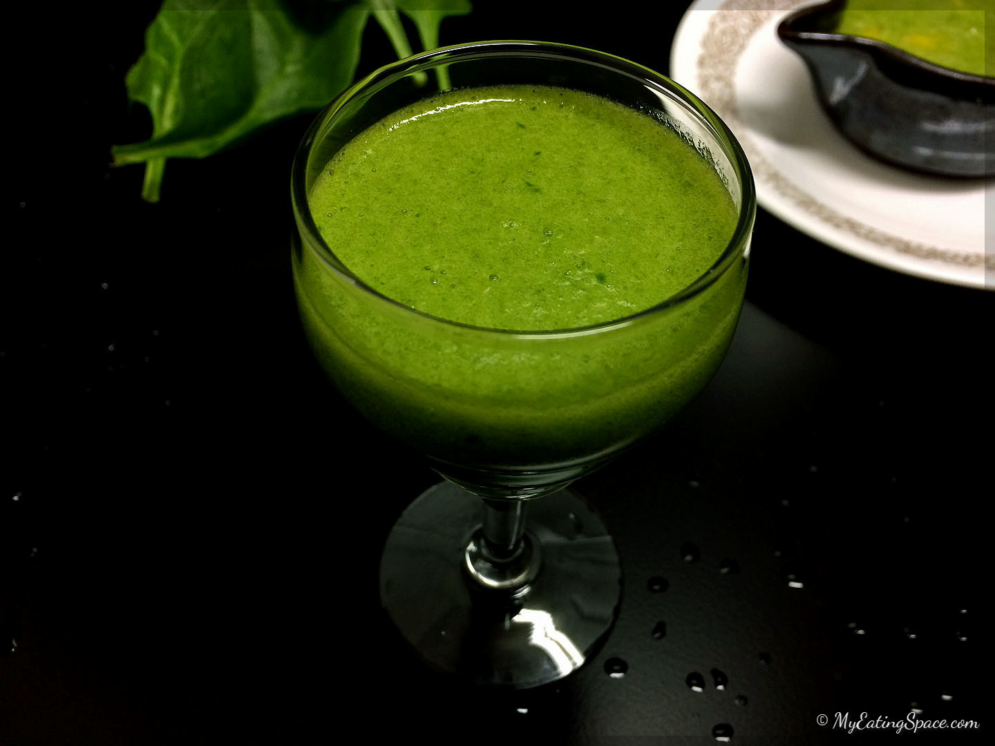 Unripe green mango spinach smoothie is a hydrating drink with a balanced sweet and sour flavor and keeps you healthy. Green mangoes are added raw. The drink is purely vegan and gluten free. Get more recipes at myeatingspace.com