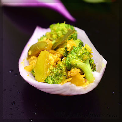 Tomatillo broccoli stir-fry, a healthy broccoli side dish made with coconut and turmeric powder. They are vegan and gluten-free. Get more healthy recipes at myeatingspace.com