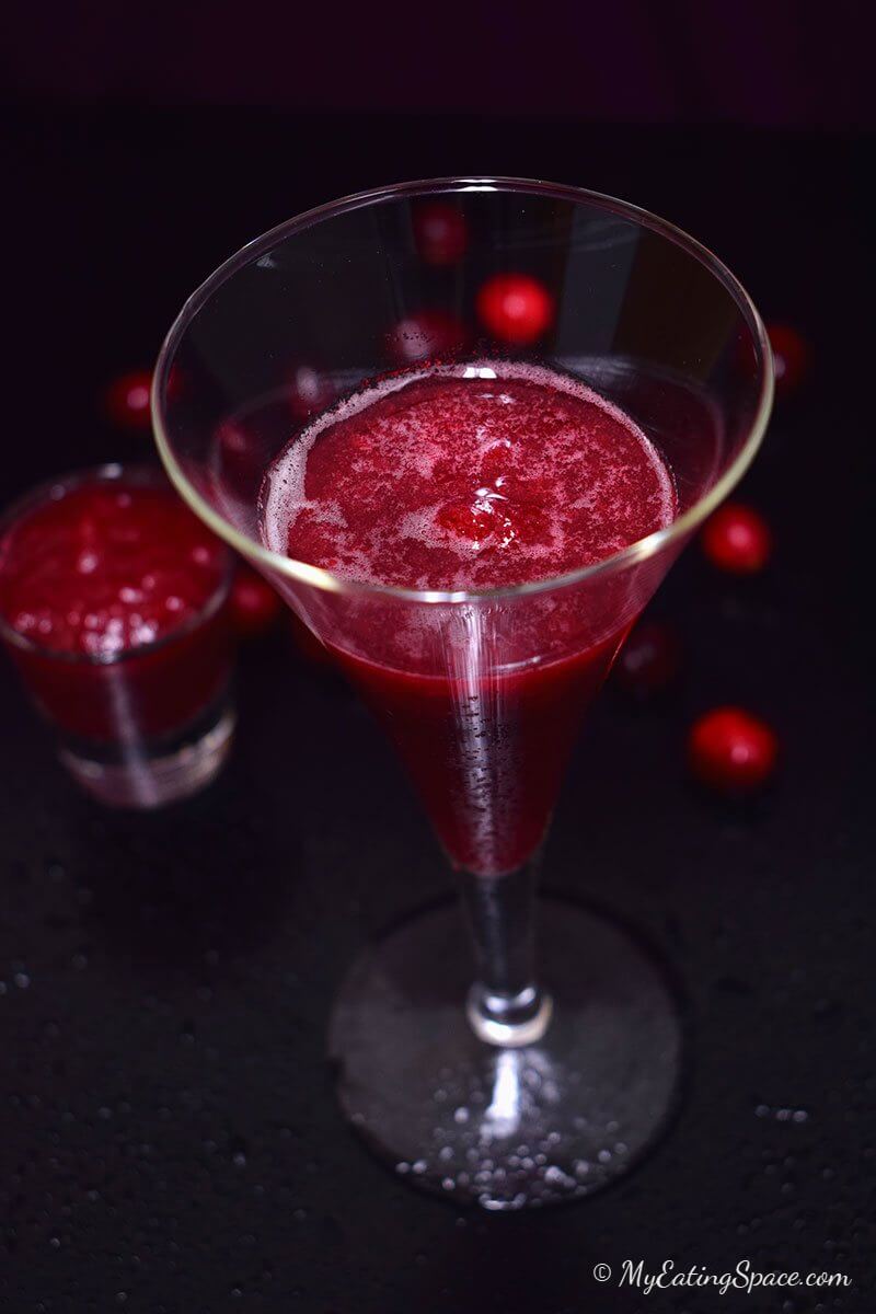 Orange cranberry slush, an instant cool drink made from homemade cranberry sauce. Make the sauce ahead and enjoy a cool slush all year round. More recipes at http://myeatingspace.com/