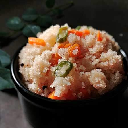 Vegetable Upma with made with semolina carrot, beans, mustard, curry leaves.