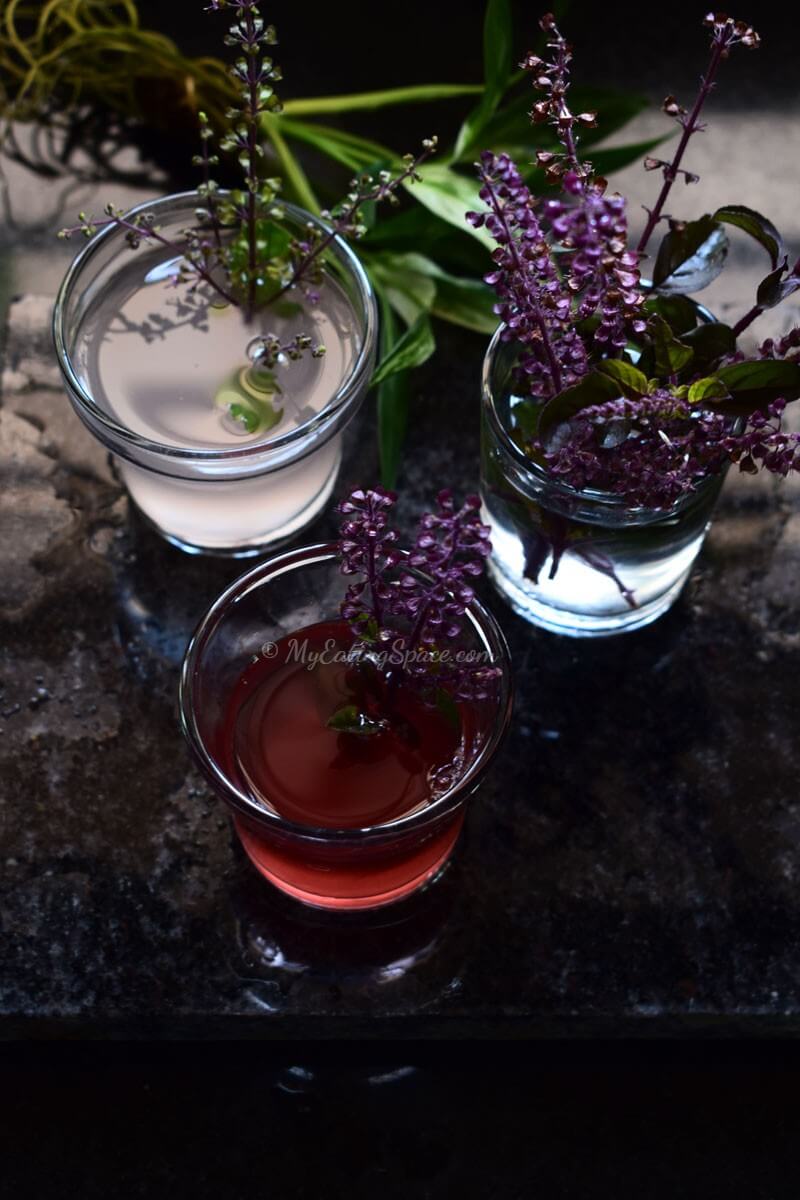 Herbal wine with Holy basil leaves and flowers.