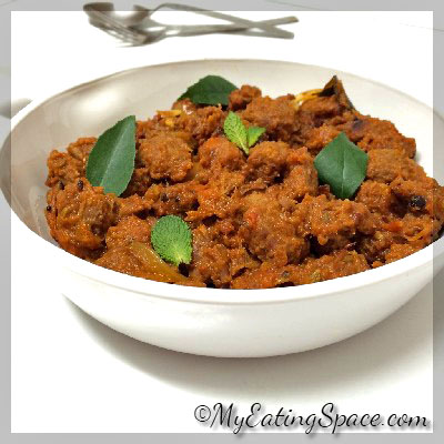 Beef curry- Kerala style and spicy. The tempting aroma of this dish will make you crave more of this spicy beef curry.