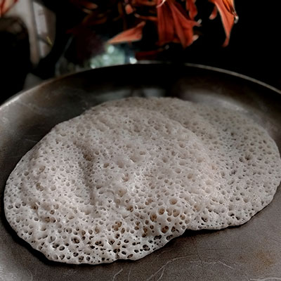 Kerala Appam made with raw rice, coconut, and yeast. This fermented rice pancakes are one of the popular dishesfrom Kerala.They are gluten free and vegan.